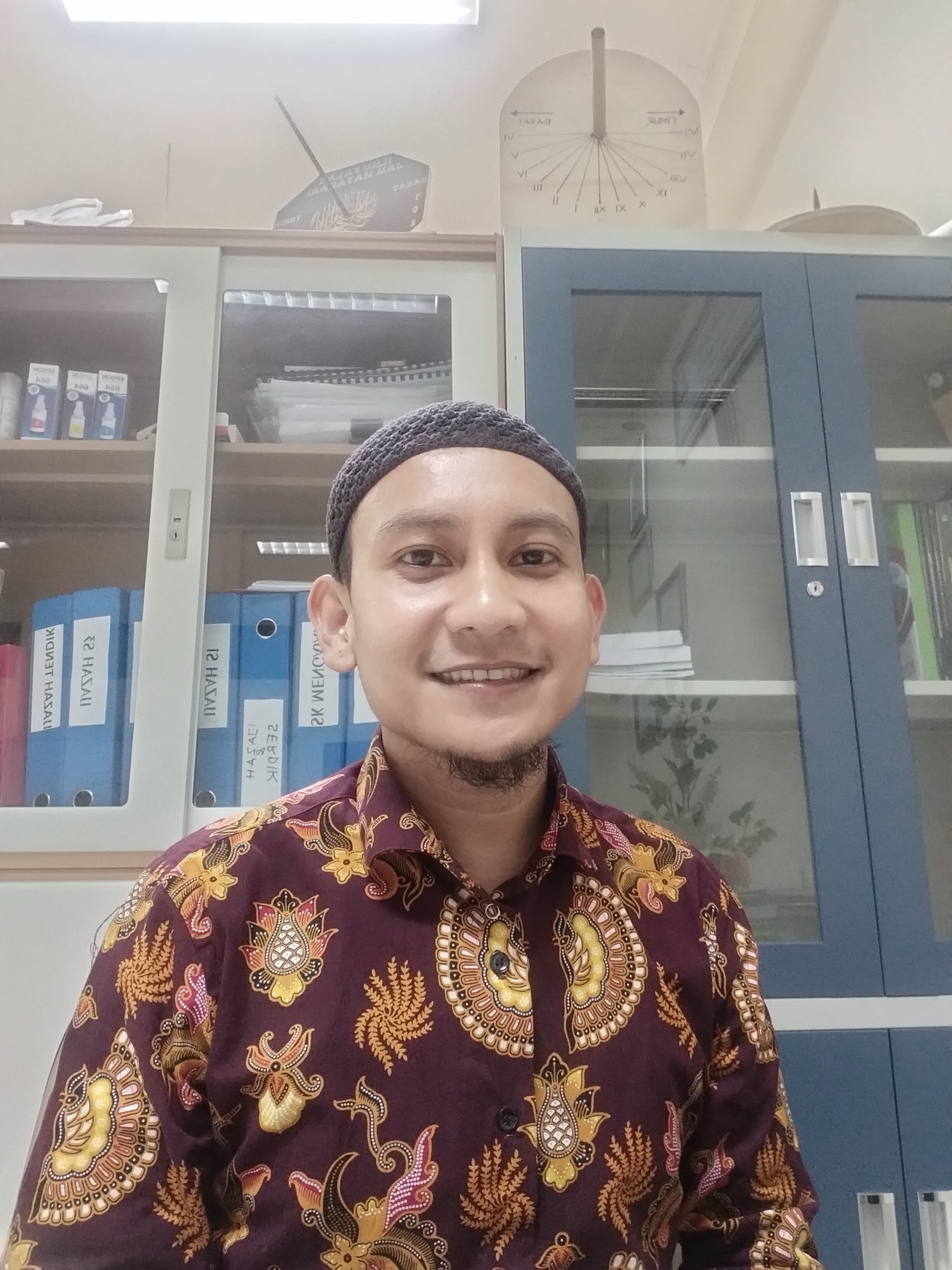 Ilham Laman, S.Pd., M.Pd.