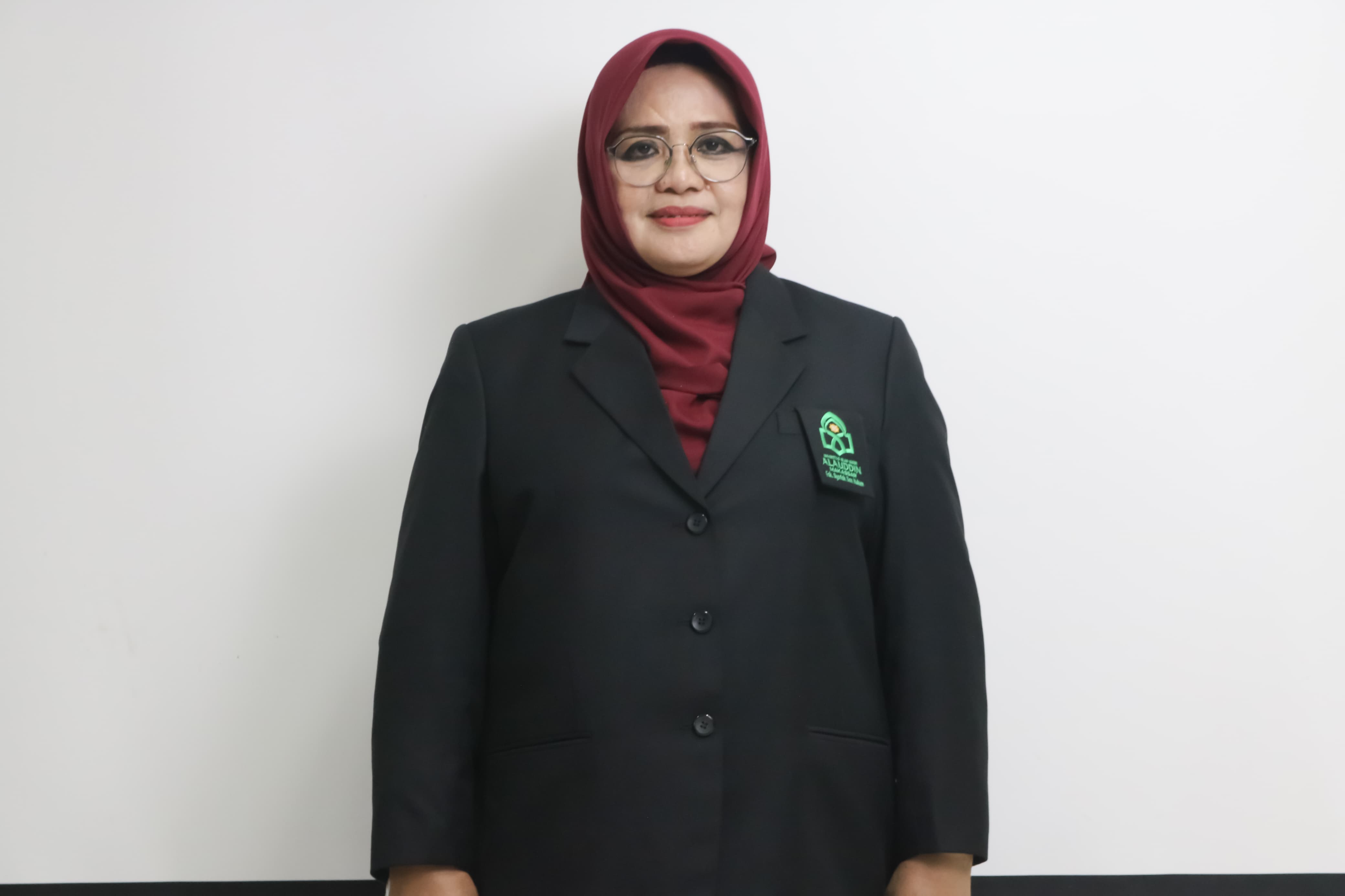 Dr. Hj. Rahmatiah HL, M.Pd.